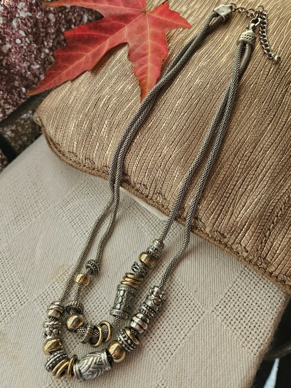 Mixed metal two strand necklace with metal beads